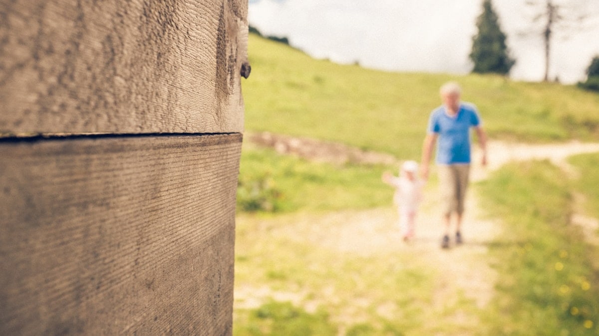 Grandpa and granddaughter hike